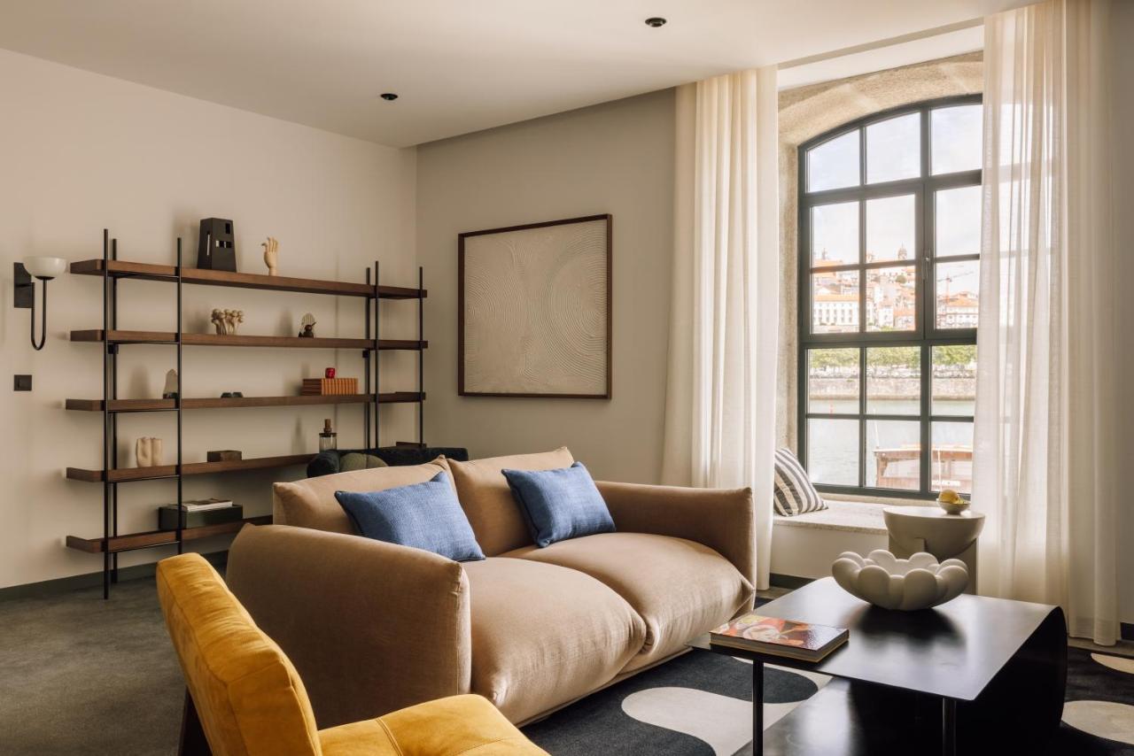 The Rebello Hotel & Spa - Small Luxury Hotels Of The World Вила-Нова-ди-Гая Экстерьер фото The living room of a two-bedroom apartment at The Standard East Village